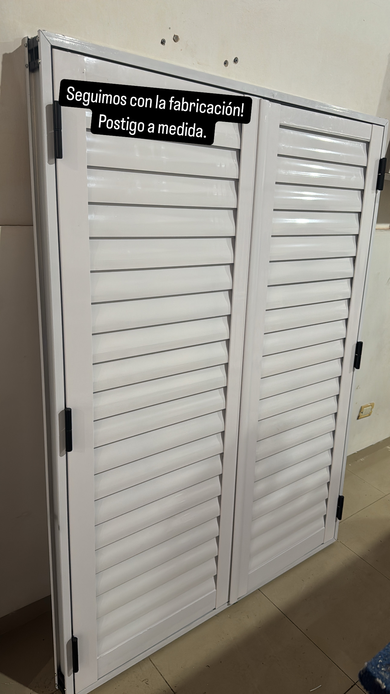 Postigo de aluminio a medida